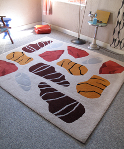Hand tufted woollen rug